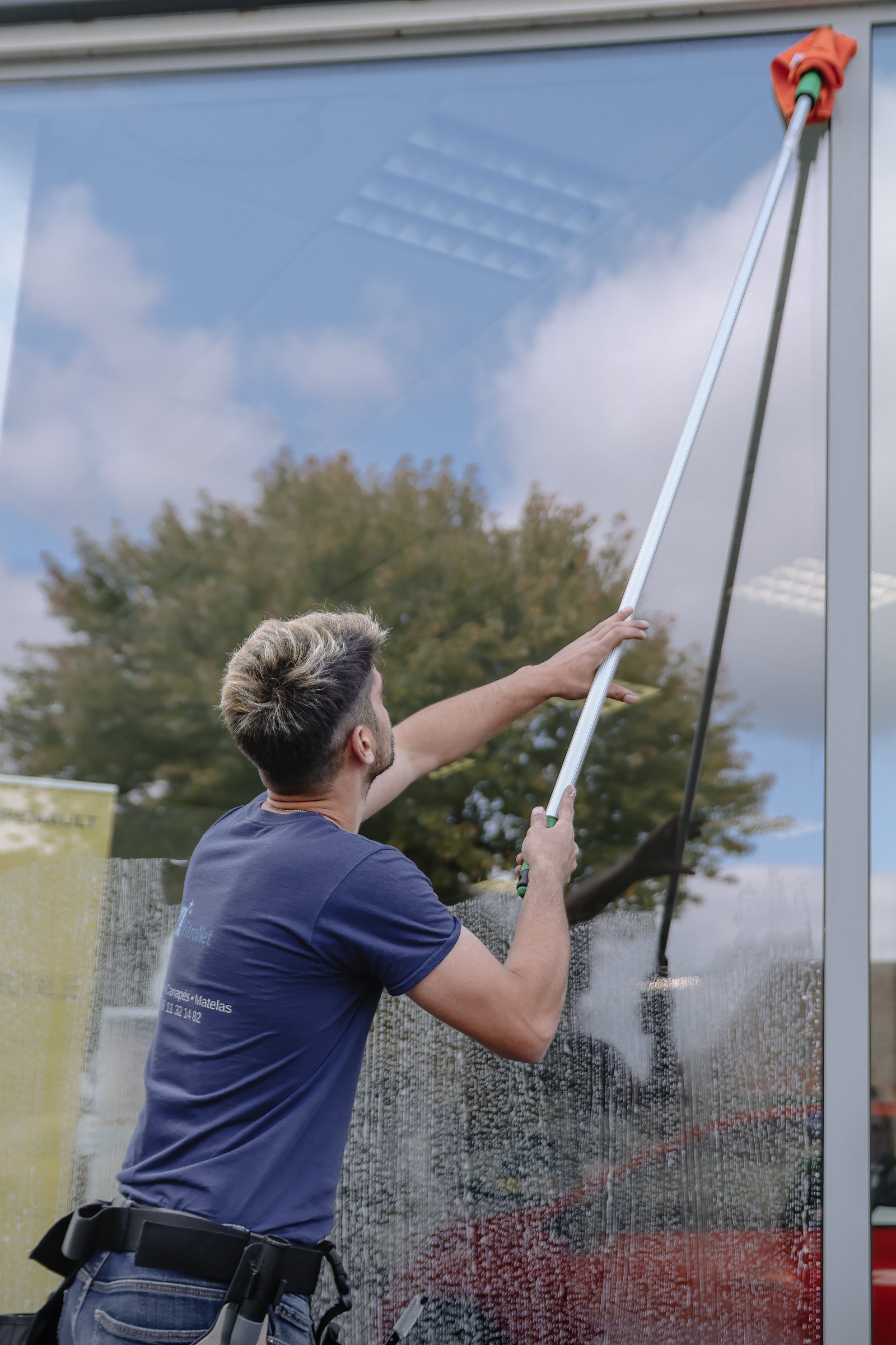 Vitres en hauteur à la perche télescopique